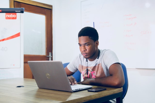 Person using a laptop to get online