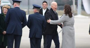 President Joe Biden is greeted by Governor of Michigan Gretchen Whitmer
