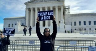 Protestor outside of Supreme Court