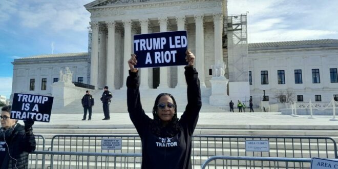 Protestor outside of Supreme Court
