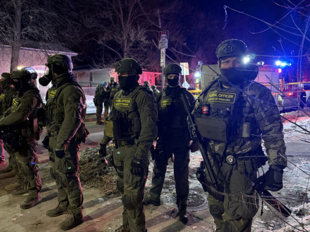 - Poli Alert Federal Bureau of Prisons officers on the scene where a federal immigration agent shot a man in Minneapolis