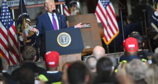 President Donald Trump touts his economic record in a speech in Rome, Georgia.