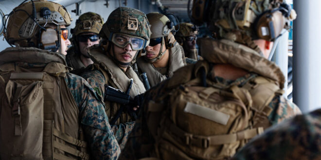 S. Sailors and Marines aboard USS Tripoli (LHA 7) arrive in the Middle East