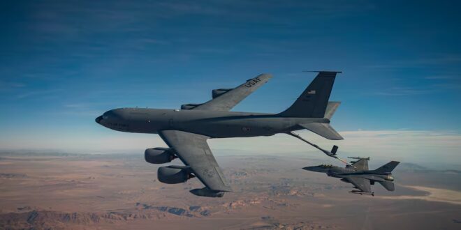 An F-16 Fighting Falcon conducts air-to-air refueling with a KC-135 Stratotanker