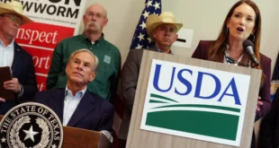 Gov. Greg Abbott listens as U.S. Secretary of Agriculture Brooke Rollins speaks at a presser detailing federal action on containing the spread of the screwworm in Texas