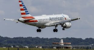 American Airlines jet on final approach, landing at Reagan National Airport